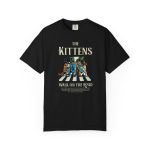 Four tabby cats crossing a street in a vintage illustration printed on the front of a shirt