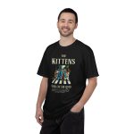 Person wearing a shirt with crosswalk kittens